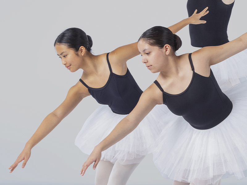 Ottawa Dance Centre School - Ballet Intensive Program students in black leotards and white tutus